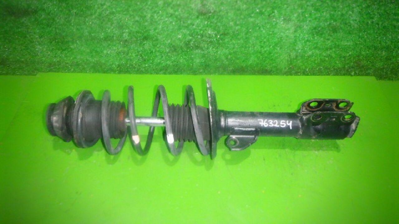 Стойка левая передняя  TOYOTA AQUA, SPADE, PORTE, RACTIS NHP10, NSP140, NSP141, NCP141, NCP120, NCP125, NSP120 1NR-FE, 1NZ-FE, 2NR-FKE, 1NZ-FXE ,- 1 ракурс