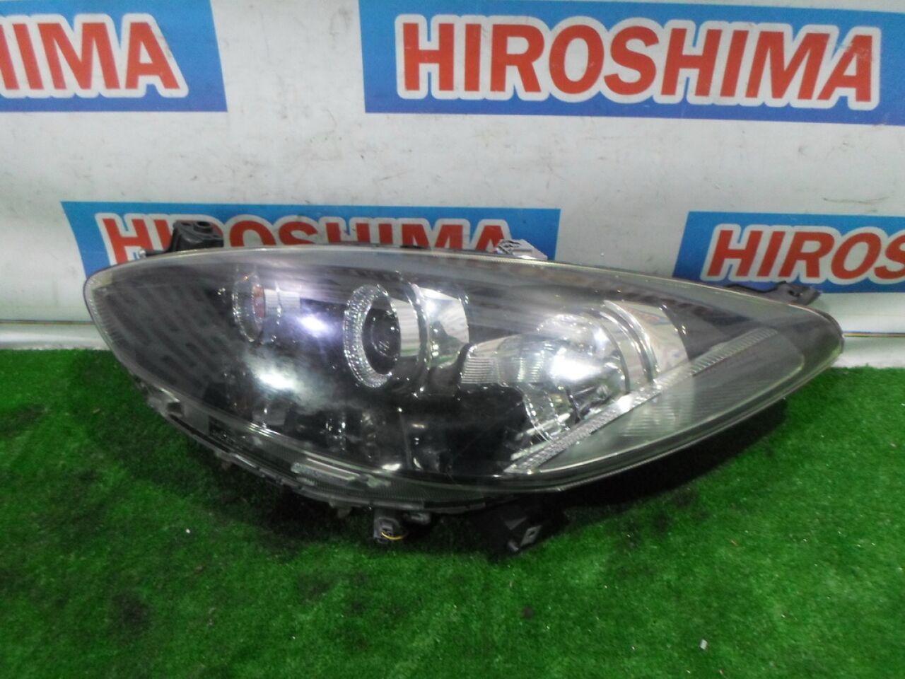 Фара левая  MAZDA DEMIO DE3FS ,P9489 XENON 1 ракурс