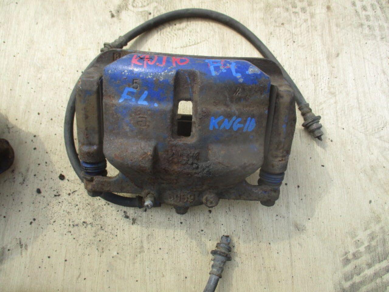 Суппорт левый передний NISSAN DUALIS KNJ10 J10 KJ10 - 1 ракурс