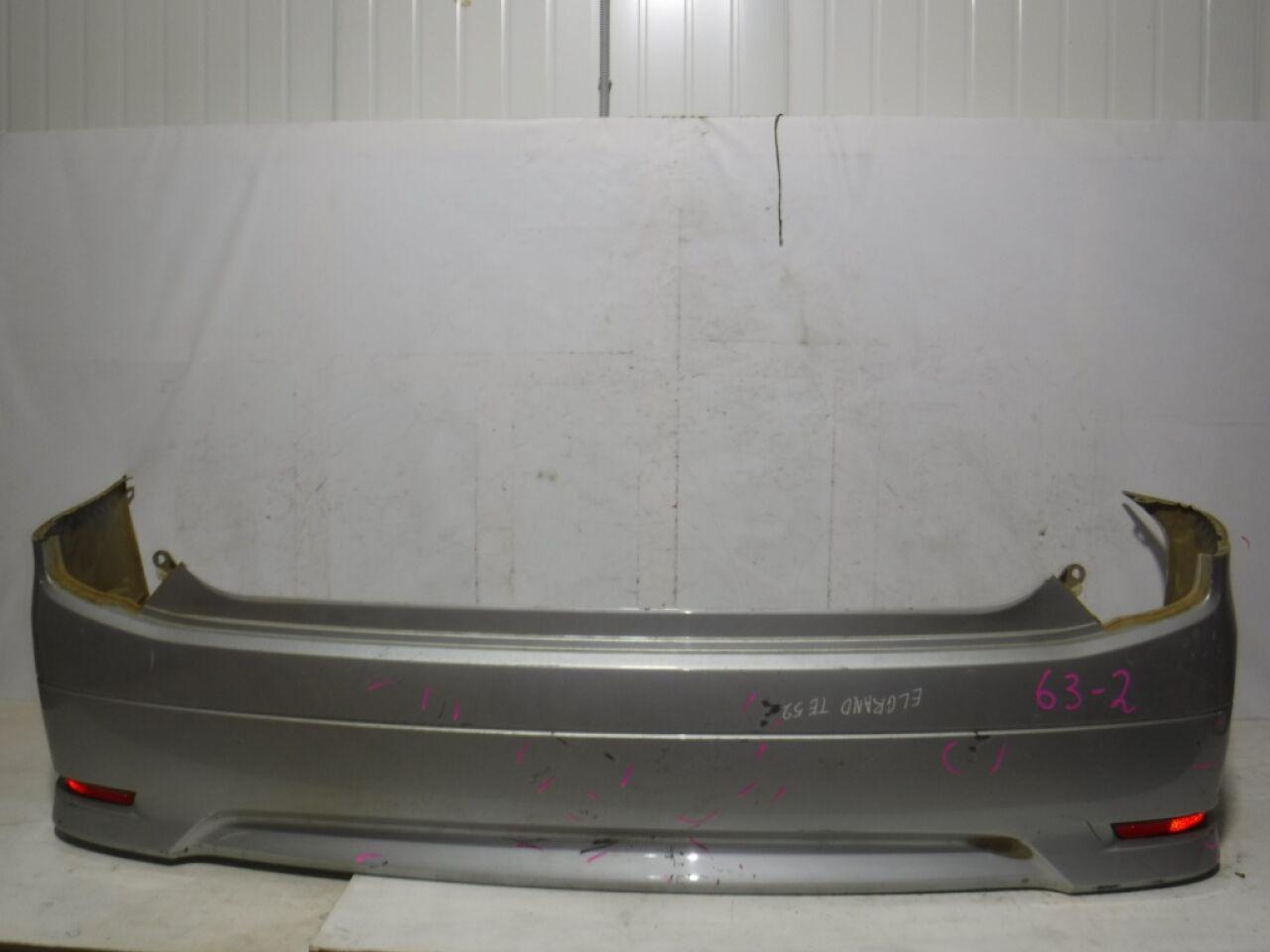 Бампер задний NISSAN ELGRAND TE52 QR25DE 85022-1JB0H 1 ракурс