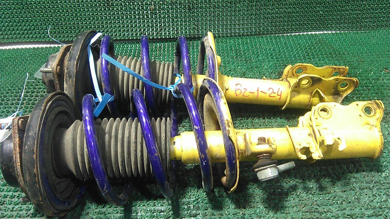 Стойка передняя NISSAN ELGRAND MNE51 VQ25DE 1 ракурс