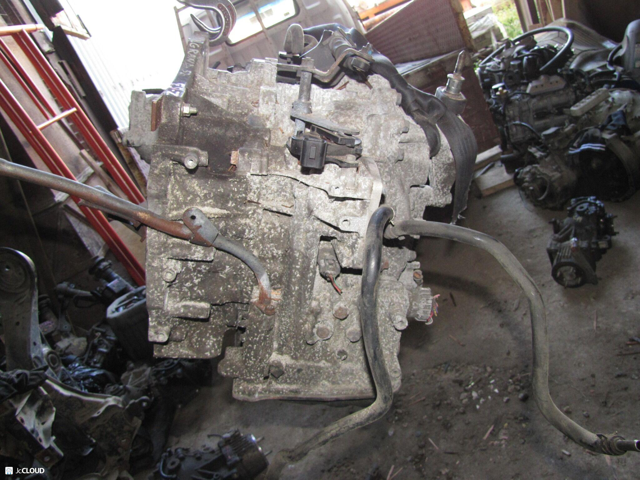 АКПП NISSAN ELGRAND TNE52 QR25DE 310203TX1B 3 ракурс