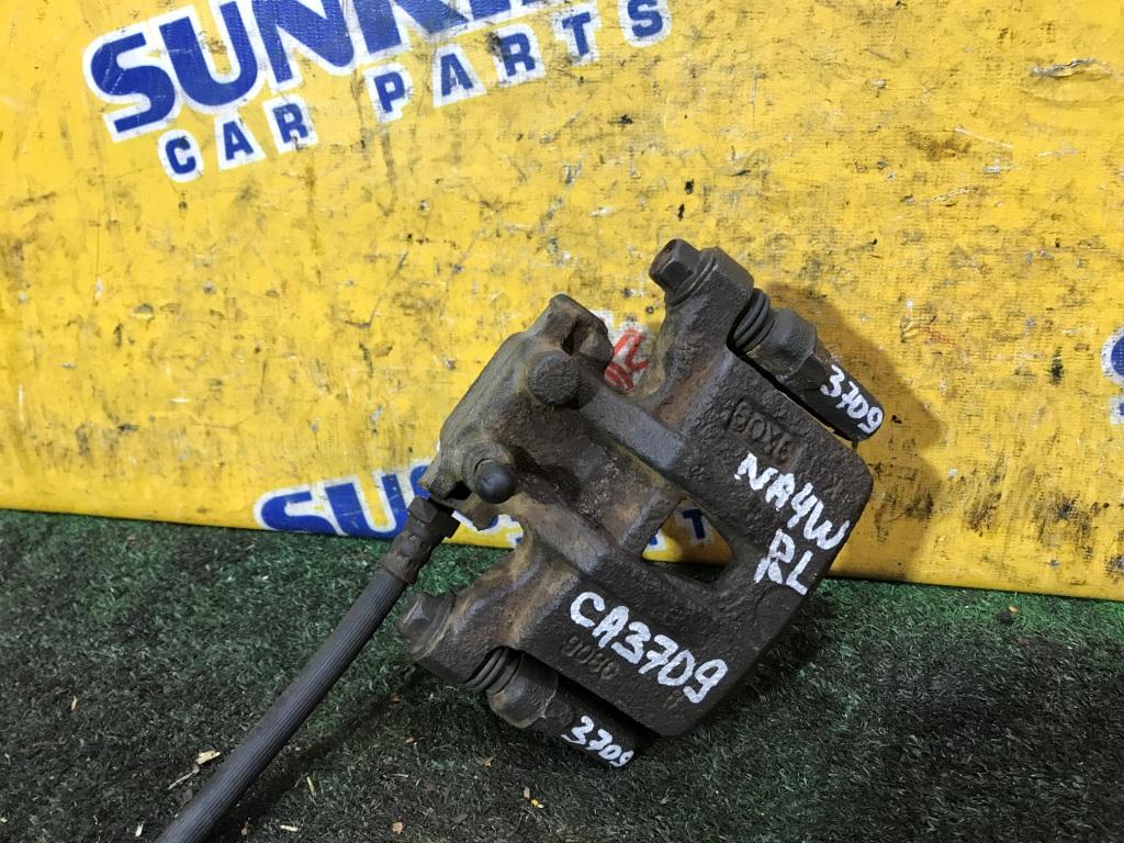 Суппорт левый задний MITSUBISHI GRANDIS NA4W 1 ракурс