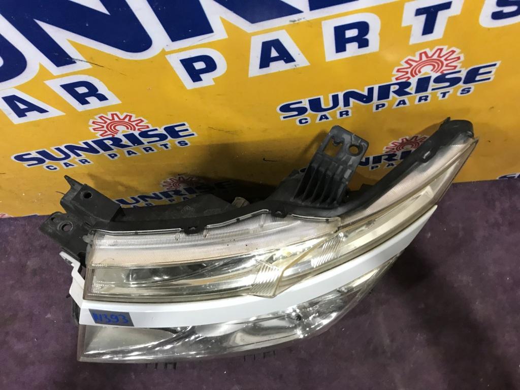 Фара левая NISSAN ELGRAND E52 10023009 2 ракурс